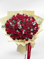 100_Red_Roses_with_yellow_wrapping_paper - BestBloomBuddy