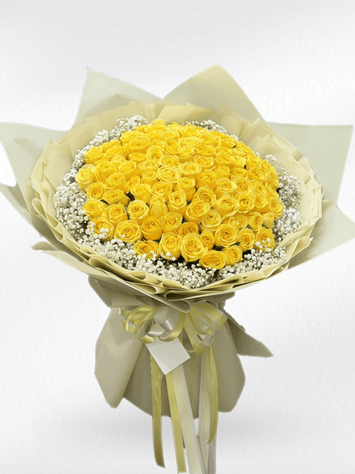 Bouquet of 100 yellow roses from BestBloomBuddy, arranged in a lush, vibrant rose bouquet perfect for special occasions.