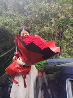 Bright red rose bouquet from BestBloomBuddy featuring 100 fresh roses arranged beautifully for a romantic display.