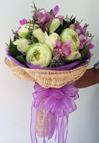 Purple Serenity – Lotus, Rose & Orchid Bouquet - BestBloomBuddy