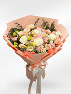 Pink and peach mixed flower bouquet from BestBloomBuddy featuring a variety of fresh, vibrant blossoms arranged in a beautiful display.