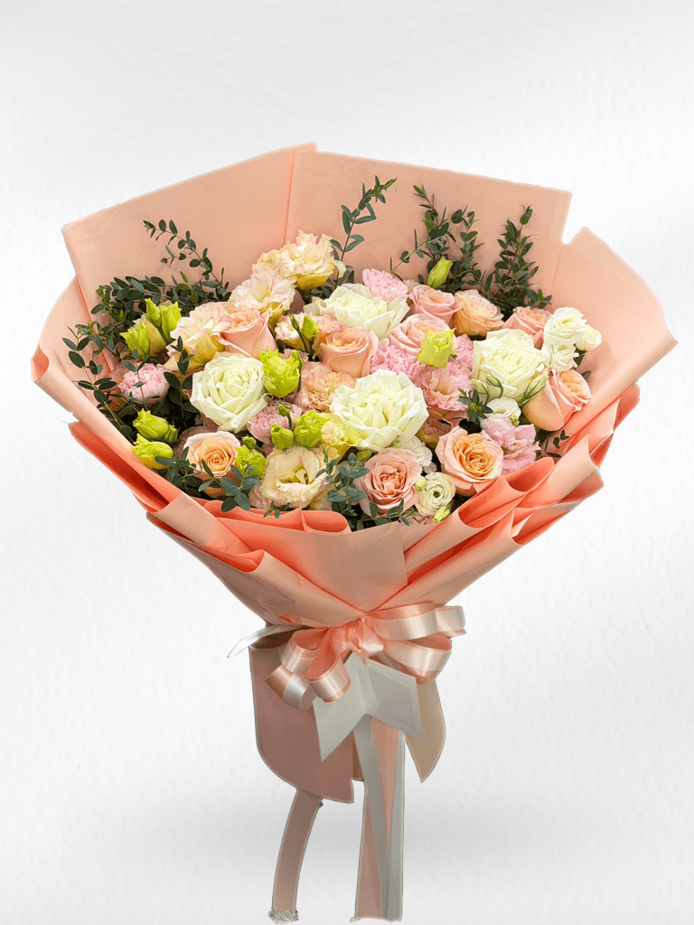 Pink and peach mixed flower bouquet from BestBloomBuddy featuring a variety of fresh, vibrant blossoms arranged in a beautiful display.