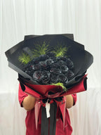 Crimson Eclipse 20 black roses bouquet by BestBloomBuddy, arranged with deep crimson and black roses in a elegant floral display.