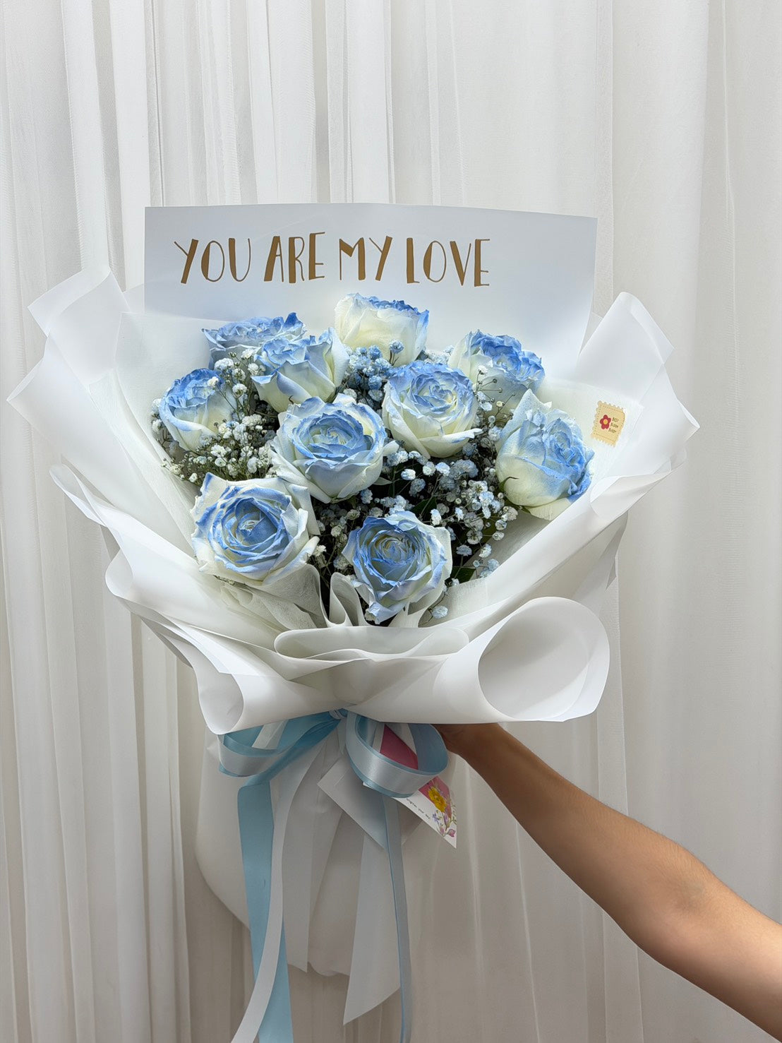Sky Kiss – 10 Blue Roses Bouquet - BestBloomBuddy