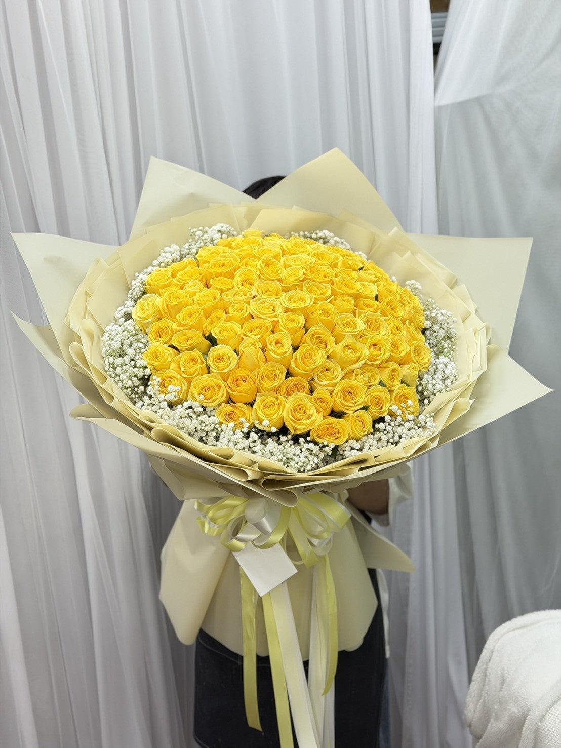 Fresh Aurora Romance yellow roses bouquet by BestBloomBuddy, showcasing vibrant, fully bloomed roses arranged in a beautiful bouquet.