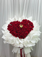 Heart of Love – 100 Red Roses Heart Bouquet with White Lily - BestBloomBuddy