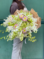 Garden of Paradise – Orchid and Lotus Bouquet - BestBloomBuddy