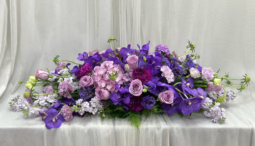 Evening Elegance – Flower Centerpiece (Purple Flower) - BestBloomBuddy