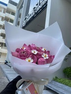 Pink lotus bouquet from Pure Grace by BestBloomBuddy, featuring vibrant pink lotus flowers arranged beautifully.