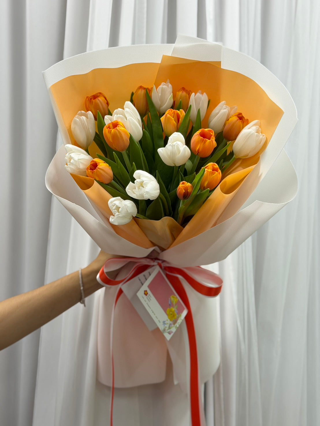Sweet Solstice – 20 Orange and White Tulips Bouquet
