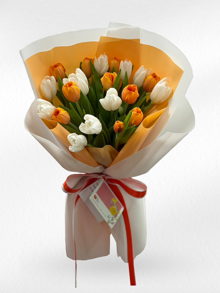 Sweet Solstice – 20 Orange and White Tulips Bouquet