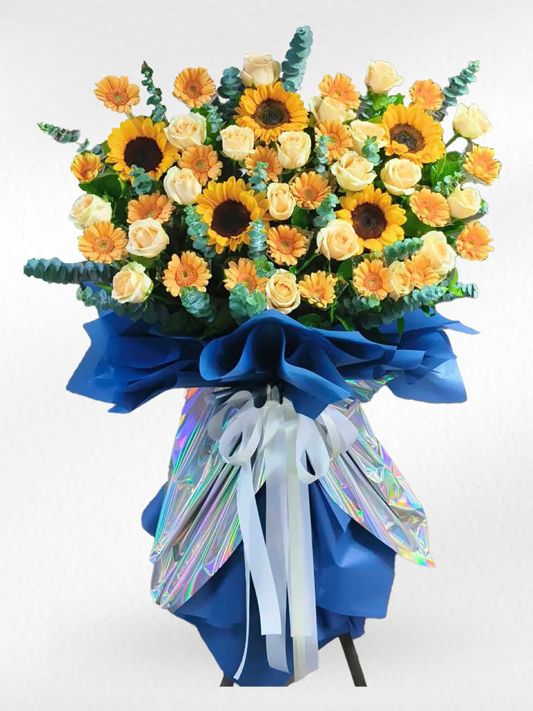 Golden Sunburst flower stand by BestBloomBuddy for grand openings, featuring vibrant yellow and gold floral display with decorative design.