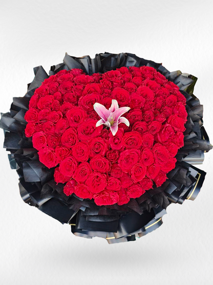 Heart of Passion – 100 Red Roses Heart Bouquet with Pink Lily