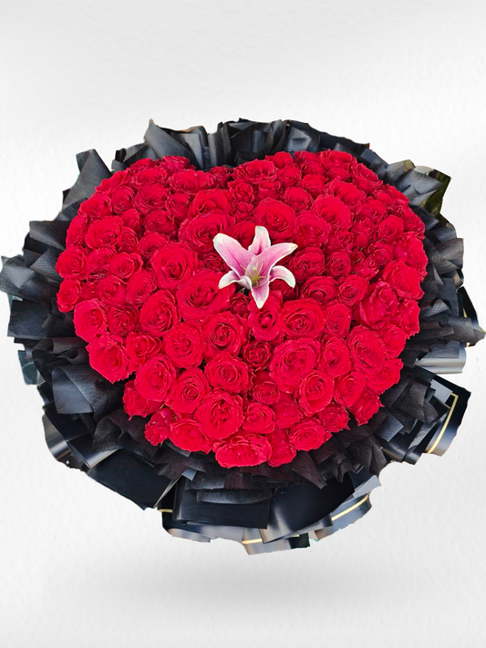 Heart of Passion – 100 Red Roses Heart Bouquet with Pink Lily