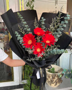 Festive Joy – 5 Red Gerbera Bouquet - BestBloomBuddy