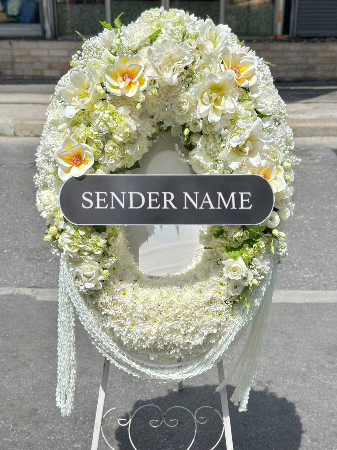 Blooming Farewell – Fresh Flower Wreath - BestBloomBuddy