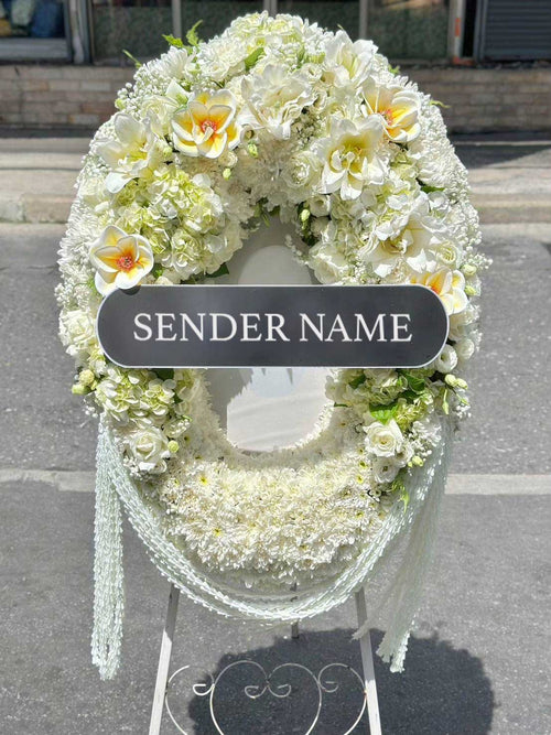 Blooming Farewell – Fresh Flower Wreath - BestBloomBuddy