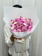 Pink lotus flowers in a bouquet, featuring the Pure Grace 20 Pink Lotus Bouquet by BestBloomBuddy, displayed with vibrant blooms.