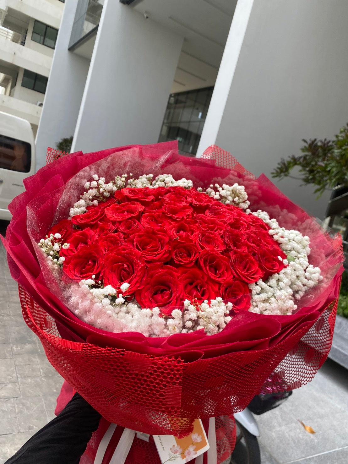 Love’s Flame - 50 Red Roses Bouquet - BestBloomBuddy
