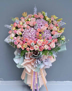 BestBloomBuddy Pastel Blossom Dream grand opening flower stand with soft pastel blooms and elegant arrangement
